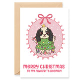 Christmas card with a dog illustration and 'Merry Christmas to my favourite hooman!' text.